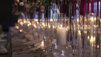 Elegant Table Setup with Colorful Flowers and Lit Candles for a Formal Event video