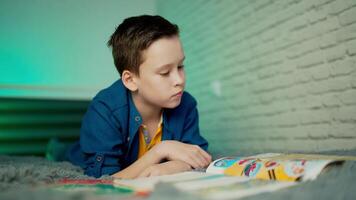 Self isolation concept. Young boy studying from home during Covid-19. All stay at home. Remote studying from home during Quarantine. video