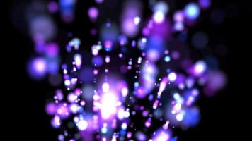 Abstract animation concept of colored particles for celebrating birthdays and holidays. Beautiful background of colored glowing glitter particles. seamless loop video