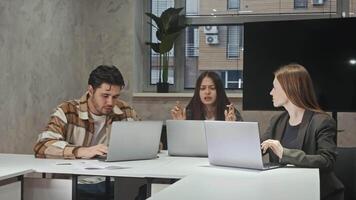 Young office workers, eagerly following open of their project online, feel great sense of excitement and happiness. After start, they launch paper airplanes in various directions, celebrating their success. video