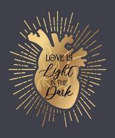Love is the light in the darkness. An image of a shining, anatomically accurate golden heart, symbolizing the warmth and sparkle that love brings to our lives. vector