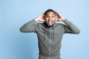 Angry irritated person screaming in front of the camera and showing his frustration, getting aggressive and furious about something. Young adult with mental health problem shows conflict. photo