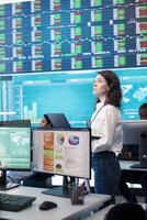 Business operator gathering insight on key performance indicators for shareholders, communicating organizational progress in order to expand the company internationally. Teamwork. photo
