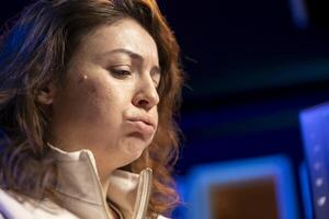 Programmer pouting in frustration while doing software quality assurance, finding major errors in source code. Close up of annoyed engineer upset after inspecting coding on PC and seeing many issues photo