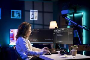 Developer in neon lit apartment implement security measures, protecting company systems and data. System administrator working from home, testing and debugging Javascript code photo