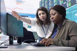 Chief executive officer supervising accounting activity to evaluate the financial operations correctly, ensuring resource allocation. General director working closely with an assistant. photo