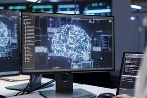 Software developer working in data center with artificial intelligence technology to process massive datasets, close up. IT professional in server hub storing data used for deep learning photo