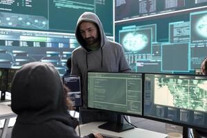 Governmental hackers analyzing big data for cyber threat detection, working at agency desks. Professional expert woman analyzes cyber intelligence and prevention of digital threats. photo