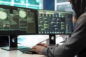 Cyber intelligence team of experts in a governmental hacking room, implementing ways to protect national secrets. Digital security, cyber surveillance and prevention of cyberterrorism. photo