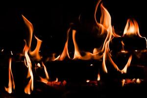 Red blaze Fire flame on a black background photo