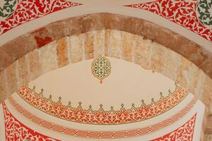 Intricate Moroccan archway decoration highlights expert stonework craftsmanship photo