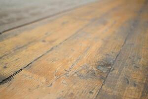 Close-Up of Rustic Wooden Floor with Textures and Grain Patterns photo