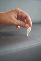 Detailed instructions for effectively removing chewing gum from fabric, with closeup view focus photo