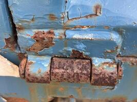 old rusty metal door with a lot of rust photo