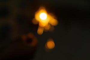 An abstract blurry background of firework in night for new year event photo