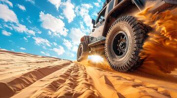 Powerful 4x4 vehicle expedition car exploring desert sand dunes. Safari in the desert photo