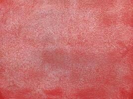 Red wall.Cement Red plaster wall have rough surface concrete. For texture background images.Red paper background, colorful paper texture. photo