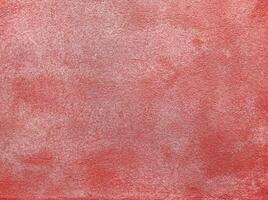 Red wall.Cement Red plaster wall have rough surface concrete. For texture background images.Red paper background, colorful paper texture. photo