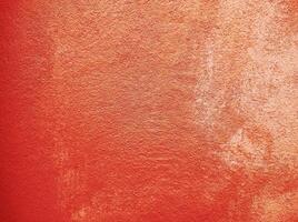 Red wall.Cement Red plaster wall have rough surface concrete. For texture background images.Red paper background, colorful paper texture. photo