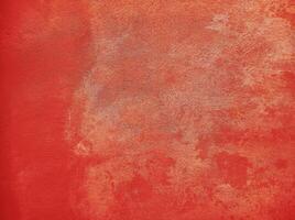 Red wall.Cement Red plaster wall have rough surface concrete. For texture background images.Red paper background, colorful paper texture. photo