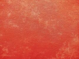 Red wall.Cement Red plaster wall have rough surface concrete. For texture background images.Red paper background, colorful paper texture. photo