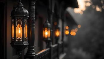 Middle Eastern style lanterns hanging from a wrought iron balcony, surrounded by intricate wooden carvings, against a warm, blurred background with golden bokeh lights 2 photo
