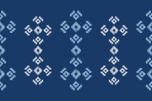 Fabric pattern with blue color motif background color ikat pattern. vector