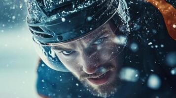 Ice hockey player wearing helmet and looking intense during snowfall photo