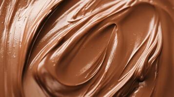 Melted milk chocolate cream creates delicious swirls background photo