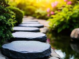 Dew covered stepping stones in tranquil Japanese garden at sunset photo