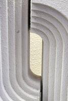Abstract White Curved Lines concrete. modern building in minimal style photo