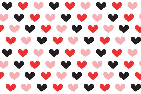 Seamless pattern with red and black hearts on a white background
