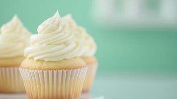 Freshly Baked Vanilla Cupcakes With Creamy Frosting on a Soft Pastel Green Background Perfect for Bakery Menus and Spring Celebrations photo