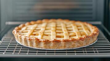 Golden Brown Homemade Pie Baking in Oven With Crispy Lattice Crust and Sweet Aroma, Capturing Freshly Baked Dessert Perfection, Ideal for Culinary Blogs, Recipes, and Cozy Kitchen Scenes photo