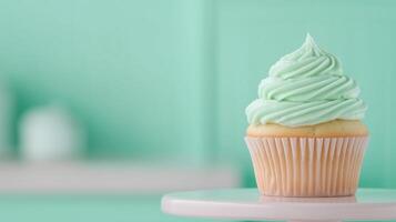 Freshly Baked Vanilla Cupcake with Creamy Frosting on Pastel Background Confectionery Dessert Photography photo