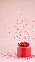 Gift Box With Red Bow and Flying Confetti on Pink Background Celebration Surprise Concept photo