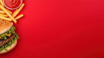 Delicious Fast Food Spread with Juicy Burger and Crispy Fries on Vibrant Red Background for Modern Food Advertising and Menus photo