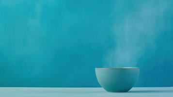 Porcelain Dye Workshop Featuring a Minimalist Green Screen Backdrop with Ceramic Bowl and Emanating Steam for Contemporary Design and Conceptual Art photo