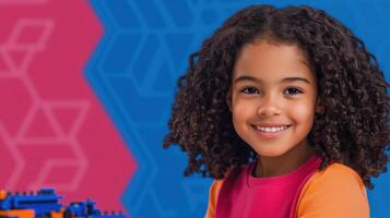 Young Girl Smiling While Building a Robot at Science Fair in Colorful Setting with Geometric Shapes photo