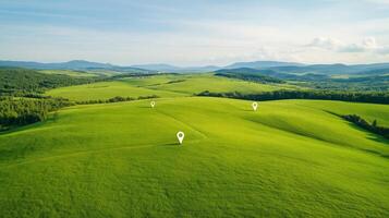 Aerial View Of Vast Green Landscapes With Digital Location Markers Symbolizing Connectivity And Technological Networks Amid Rolling Hills Under Clear Blue Sky photo