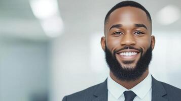 Portrait of a Smiling Black Businessman with Beard in Office Setting Wearing Formal Suit and Tie Ideal for Professional Corporate Branding and Diversity Representation in Stock Photography photo