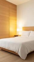 Modern Minimalist Bedroom with Double Bed and Wooden Design Featuring Warm Lighting Beside Bedside Table and Sliding Door for Cozy Interior Style and Tranquil Sleep Environment photo