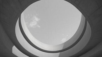 Surrealist Abstract Architecture With Circular Layers Under Cloudy Sky in Monochrome Minimalist View Art Design Background photo