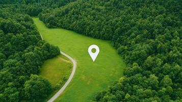 Aerial View of Lush Green Landscape with Location Marker Highlighting Connectivity and Digital Mapping Networks photo