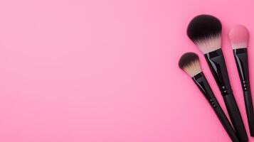 Makeup Brushes and Compact Powder on Pink Background with Copy Space for Beauty and Fashion Concepts photo