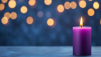 Flaming Purple Aroma Candle with Warm Glow on Blurred Dark Background for Tranquil Nighttime Ambiance and Relaxation photo