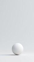 Minimalist 3D Render of Rotating White Sphere on Grey Background for Modern Design Concepts and Abstract Art Themes in Vertical Orientation photo