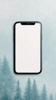 Digital Smartphone Blank Display With Forest Xmas Background For Nature-Inspired Layouts And Mobile Themes Emphasizing Vertical Orientation And Minimalist Design For Technology And Wallpaper Purposes photo