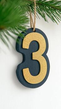 Golden Number 3 On Black Advent Calendar Hanging On Pine Branch Reflecting Holiday Warmth And Festivity In Modern Elegant Design For Seasonal Decoration And Countdown Excitement photo