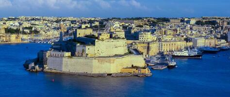 View of Fort Saint Angelo in Birgu, Malta from Valletta, across the Grand Harbour of Malta photo